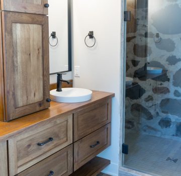 distressed wood beams and custom cabinetry for a barn restoration in princeton, wi