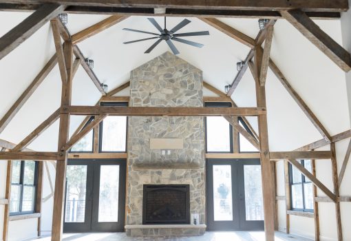distressed wood beams and custom cabinetry for a barn restoration in princeton, wi